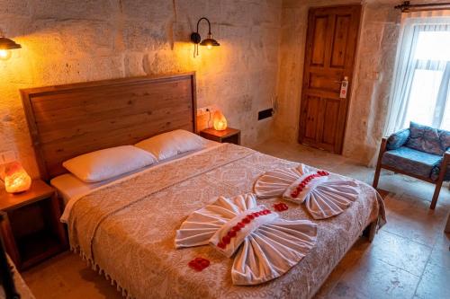 Katil atau katil-katil dalam bilik di feris cave hotel
