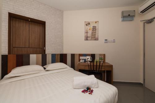 Cama ou camas em um quarto em Uptown Subang Airport