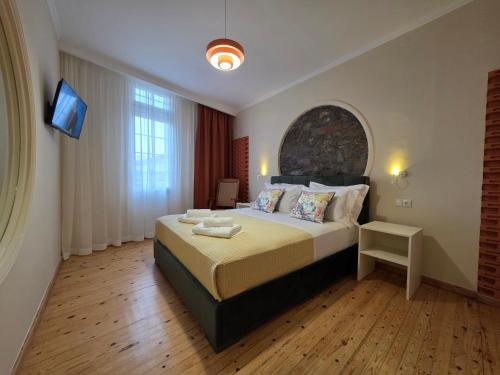 Giường trong phòng chung tại Central Bliss Apartments No1