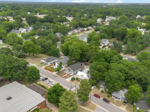an aerial view of a town with trees and a street at Boho 5BR Modern Villa w Hot Tub, Grill, Patio and Backyard in Raleigh