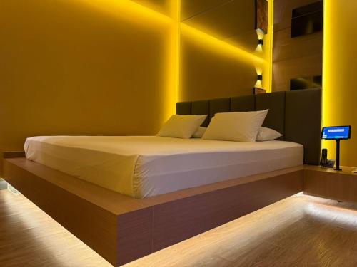 Ένα ή περισσότερα κρεβάτια σε δωμάτιο στο Motel Chavelle