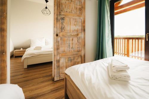 Una cama o camas en una habitación de Silent Hill in Probark