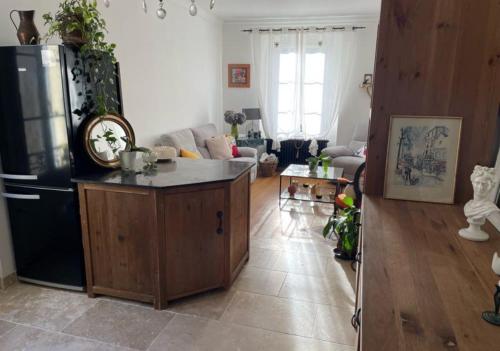 Η κουζίνα ή μικρή κουζίνα στο Cozy duplex with private garden