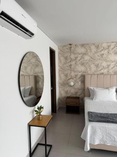 Cama o camas de una habitación en Lofts Medellin-Laureles
