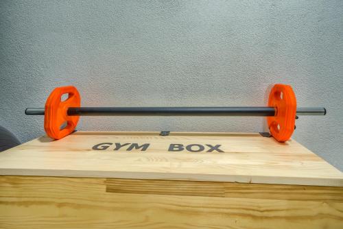 a gym box with an orange pair of scissors on it at Villa Bellevue Bast in Baška Voda