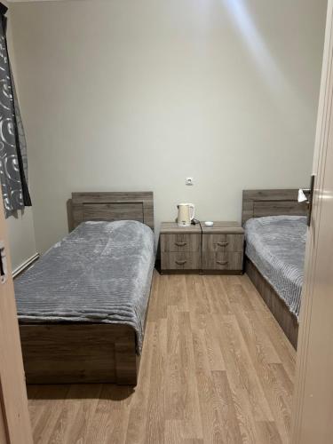 Postel nebo postele na pokoji v ubytování GM Hotel