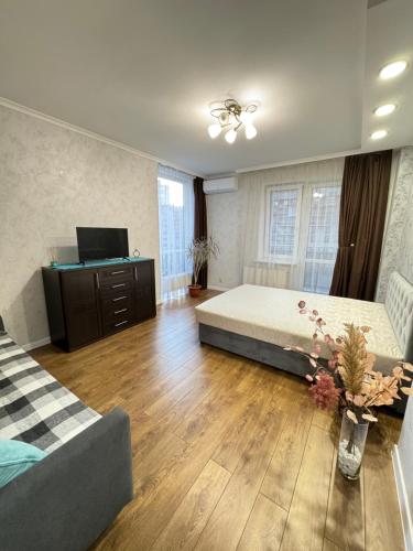 Ένα ή περισσότερα κρεβάτια σε δωμάτιο στο Vodogray Apartmens Citi Елітний комплекс, закрита територія, ДУЖЕ ЧИСТО!