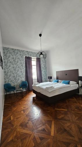 Ένα ή περισσότερα κρεβάτια σε δωμάτιο στο Center flat 160m2