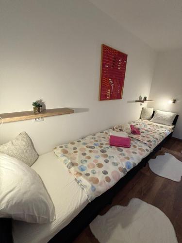 Postel nebo postele na pokoji v ubytování Apartman M - sa dvije spavaće sobe