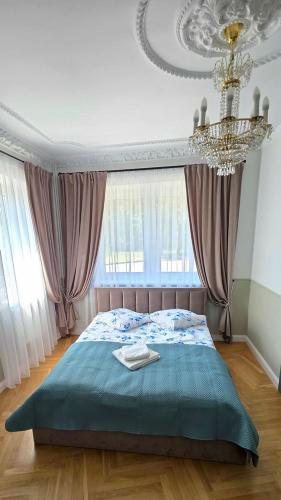 Ένα ή περισσότερα κρεβάτια σε δωμάτιο στο Felikso Vila