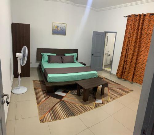 Llit o llits en una habitació de Toutaf BNB