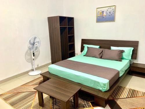 Llit o llits en una habitació de Toutaf BNB