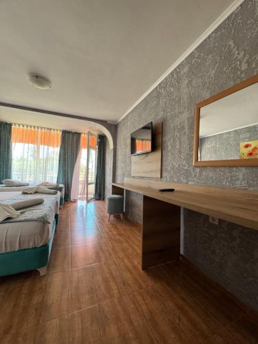 Postel nebo postele na pokoji v ubytování Hotel Surf Primorsko