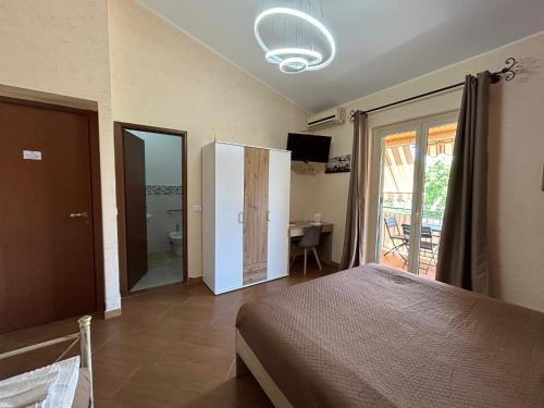 Giường trong phòng chung tại La Scala sul Giardino