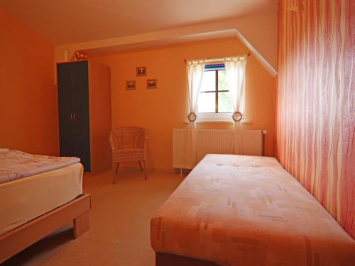 Postel nebo postele na pokoji v ubytování Spacious Stay in Wendelstorf