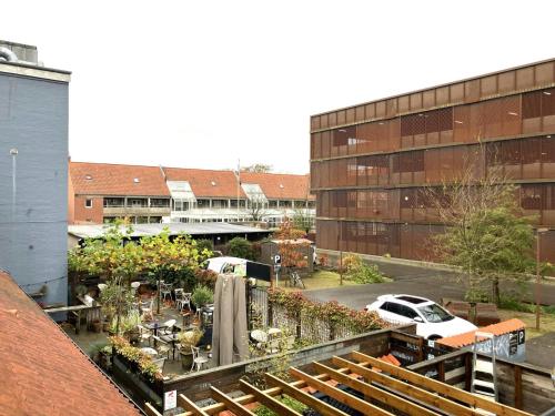 a view of a parking lot with a building at Spacious Apartment for 4 in Esbjerg