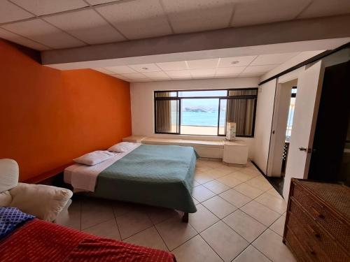 Ένα ή περισσότερα κρεβάτια σε δωμάτιο στο Casa 4 DORM - 3 VISTAMAR, 14 a 20 pax piscina propia