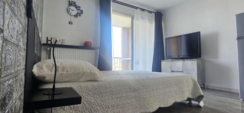 Un ou plusieurs lits dans un hébergement de l'établissement La Dolce Vita