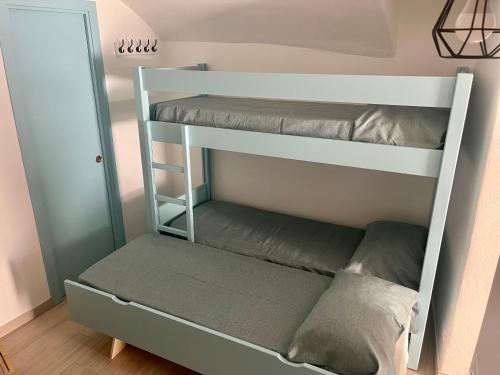 Postel nebo postele na pokoji v ubytování La Piccola Ginevra