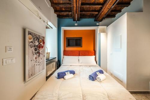 Ένα ή περισσότερα κρεβάτια σε δωμάτιο στο Romantic Apartment in Sori - 10 Meters from the Sea
