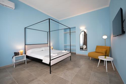 Postel nebo postele na pokoji v ubytování Aria Rooms