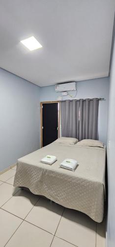 Postel nebo postele na pokoji v ubytování Hotel Graciosa Palace