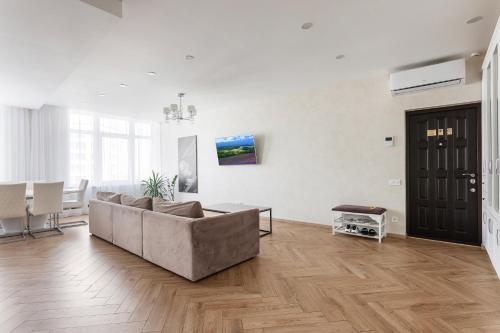 TV a/nebo společenská místnost v ubytování Direct sea view