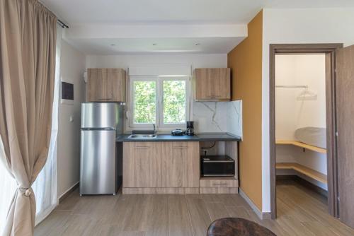 Kuchyň nebo kuchyňský kout v ubytování Twin Escape Sea & Corfu town