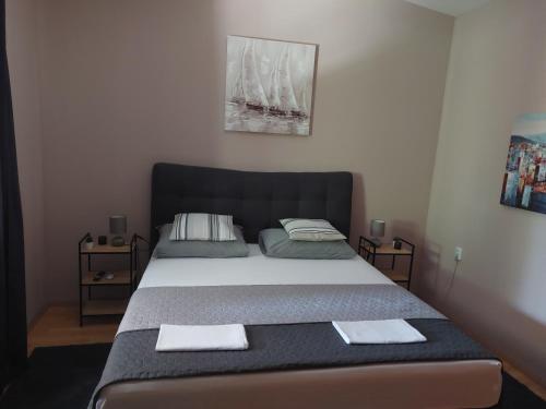 Ένα ή περισσότερα κρεβάτια σε δωμάτιο στο Apartment Mia