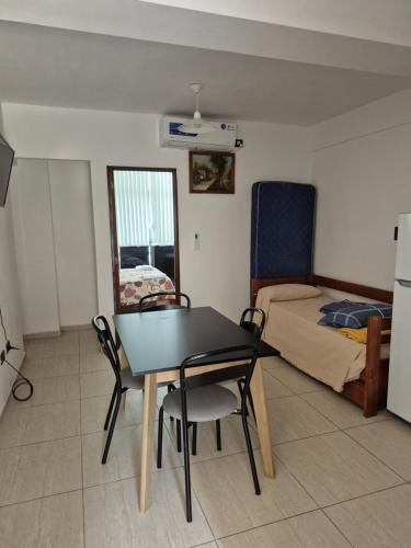 Ένα ή περισσότερα κρεβάτια σε δωμάτιο στο pedro de valdivia 219 oeste