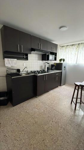 Dapur atau dapur kecil di Cozy apartment