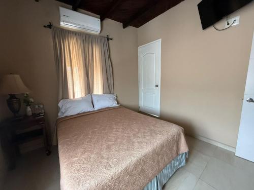 Ein Bett oder Betten in einem Zimmer der Unterkunft Hotel Carretas