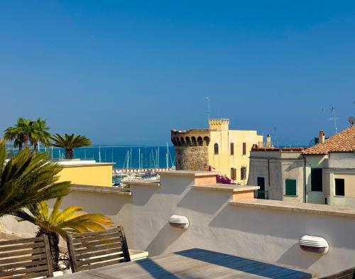 a view of the ocean from the roof of a building at LUNA SUL PORTO Seaview Apartment - Bright and Spacious Flat in Central Nettuno, Steps from the Marina, Beaches, and Train Station in Nettuno