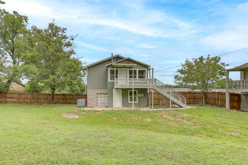 a house with a porch and a fence at Newly Renovated Unit Near Dtwn Tulsa and Hospitals! in Tulsa
