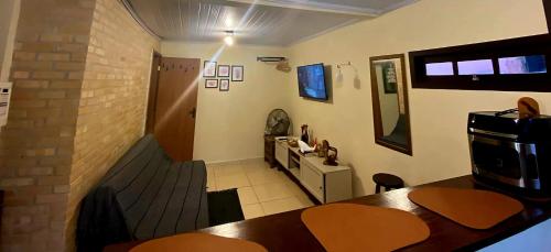TV a/nebo společenská místnost v ubytování Casa inteira Ilha Grande