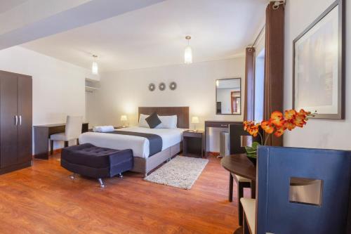 Katil atau katil-katil dalam bilik di Ankawa Hotel Boutique