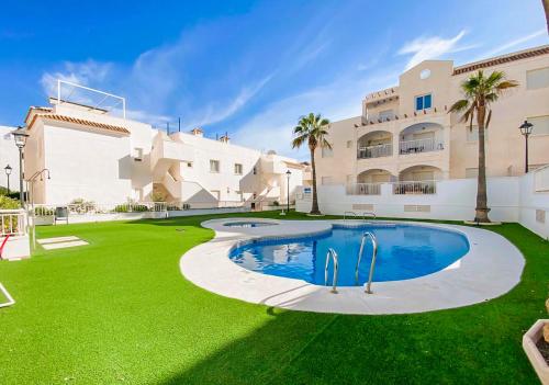 Bazén v ubytování Bohemian apartment with pool 180m from Mojacar beach nebo v jeho okolí