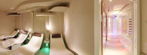 Suite & Spa Mirabelにあるベッド