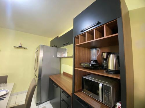 Η κουζίνα ή μικρή κουζίνα στο Casa Camargo - com mercado na frente