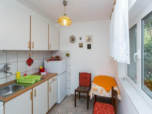 O bucătărie sau chicinetă la Apartments Aneli - One Bedroom Apartment with Terrace and Sea View A3