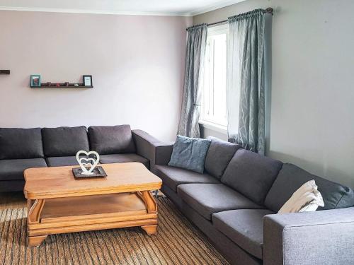 Ruang duduk di 8 person holiday home in Åmli