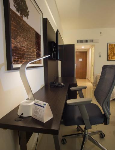 Μια τηλεόραση ή/και κέντρο ψυχαγωγίας στο Holiday Inn Express Tapachula by IHG
