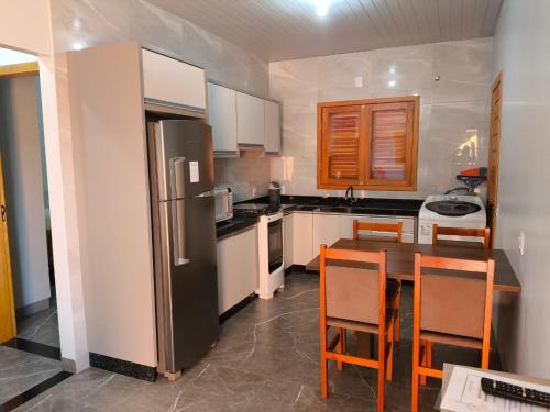 Köök või kööginurk majutusasutuses Casa aconchego em Foz do Iguaçu