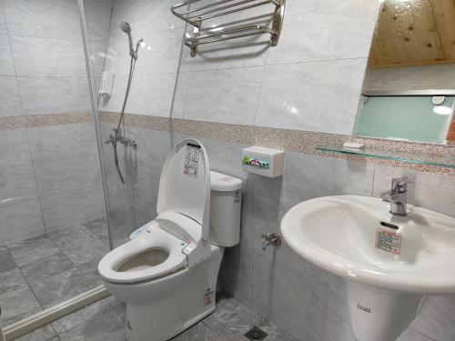 Koupelna v ubytování Chang Qing Ju Homestay