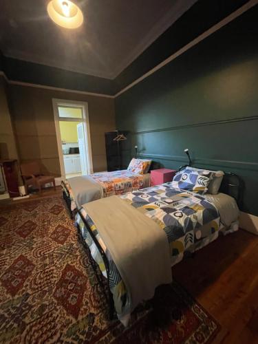 Кровать или кровати в номере HISTORIC STAR LODGE Narrandera