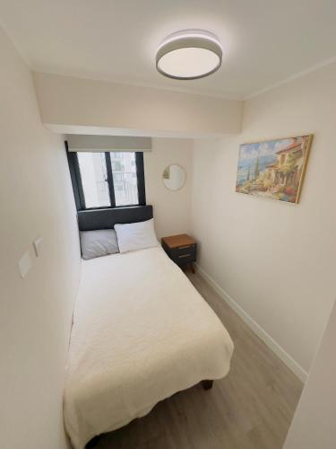 En eller flere senge i et værelse på APPARTEMENT CHIC MIRAFLORES Paradis