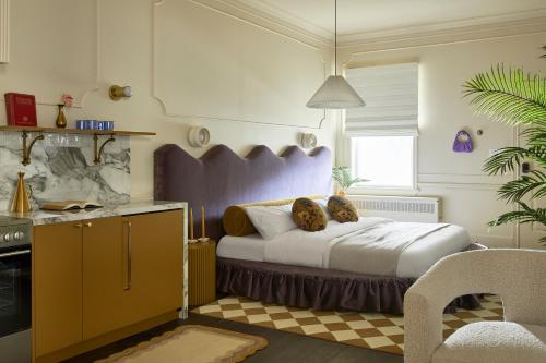Postel nebo postele na pokoji v ubytování Hotel Julie