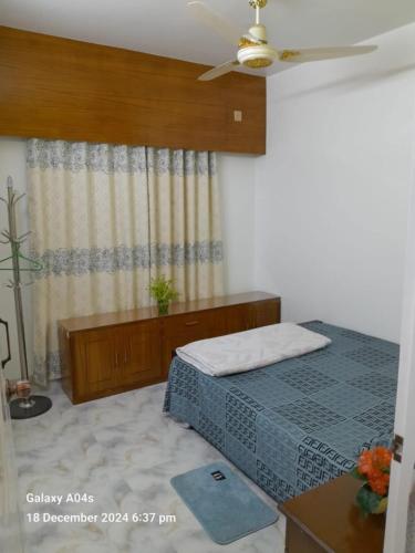 Кровать или кровати в номере Spacious 3BR Family Stay with AC