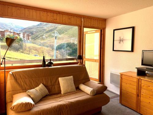Chalet 24m², 4 pers, balcon sud, parking privatif, aux pieds des pistes Les Menuires - FR-1-344-1224
