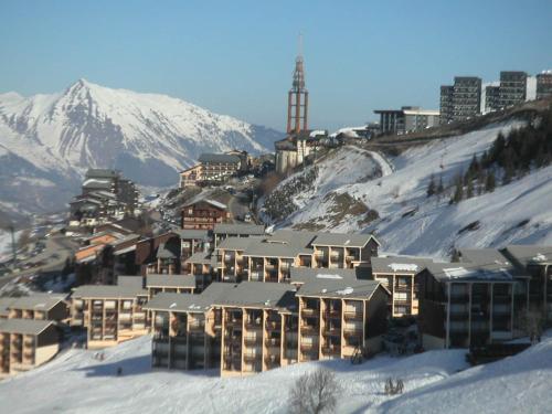 Chalet 24m², 4 pers, balcon sud, parking privatif, aux pieds des pistes Les Menuires - FR-1-344-1224